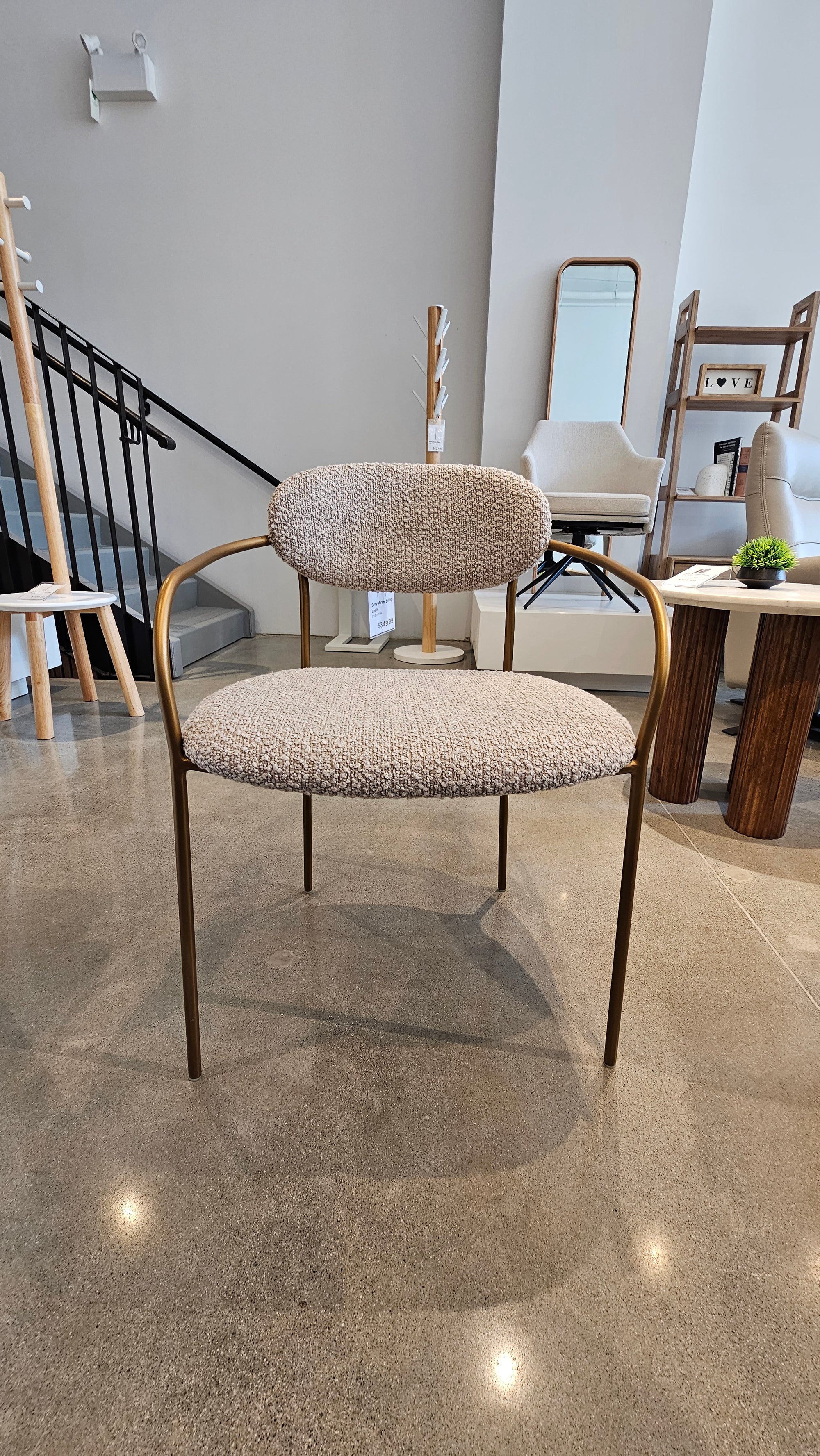 Sleek Antique Bronze Metal Arm Dining Chair – Coastal Modern Style (Floor Model)